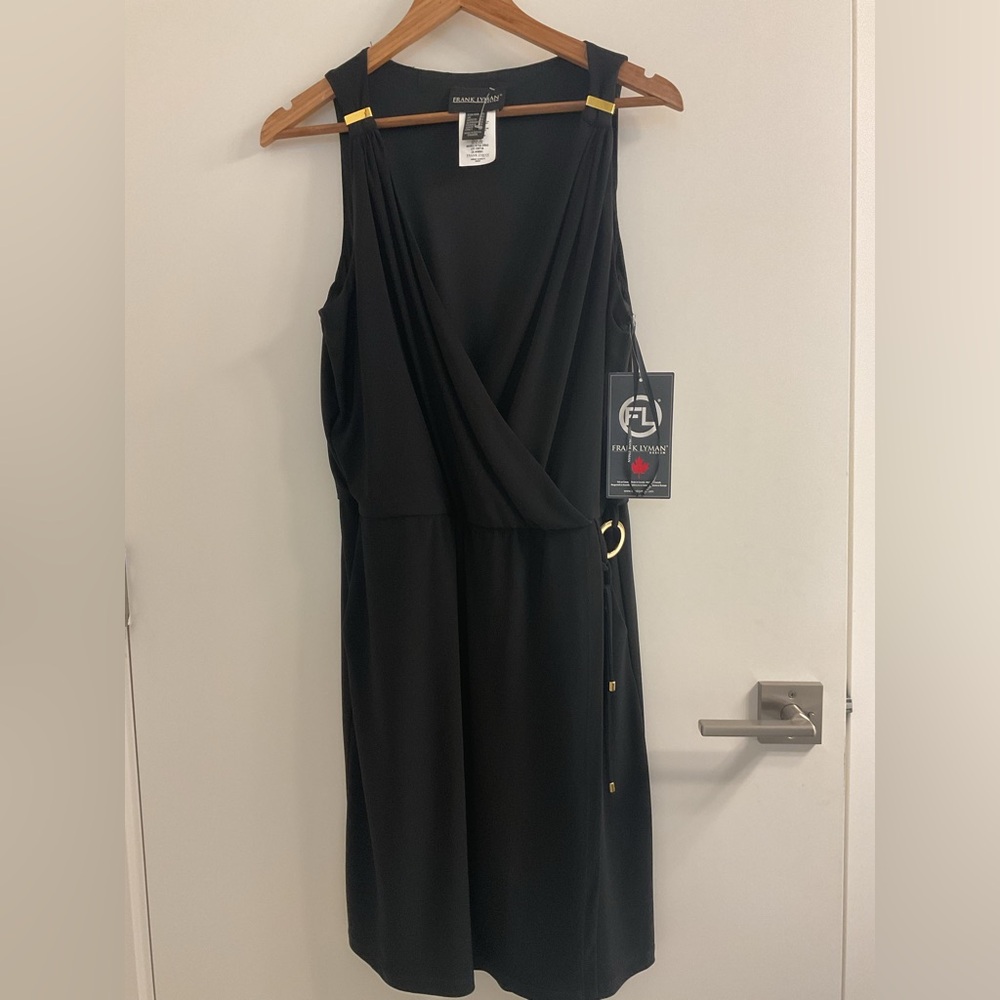 ***NWT Frank Lyman Elegant Black Sleeveless Playsuitwith pockets.